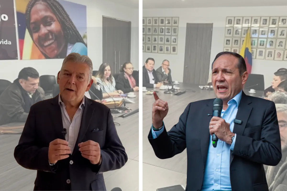 Aumento salario mínimo 2026. Composición de dos hombres hablando frente a cámaras en un espacio institucional, con una reunión de fondo desenfocada.