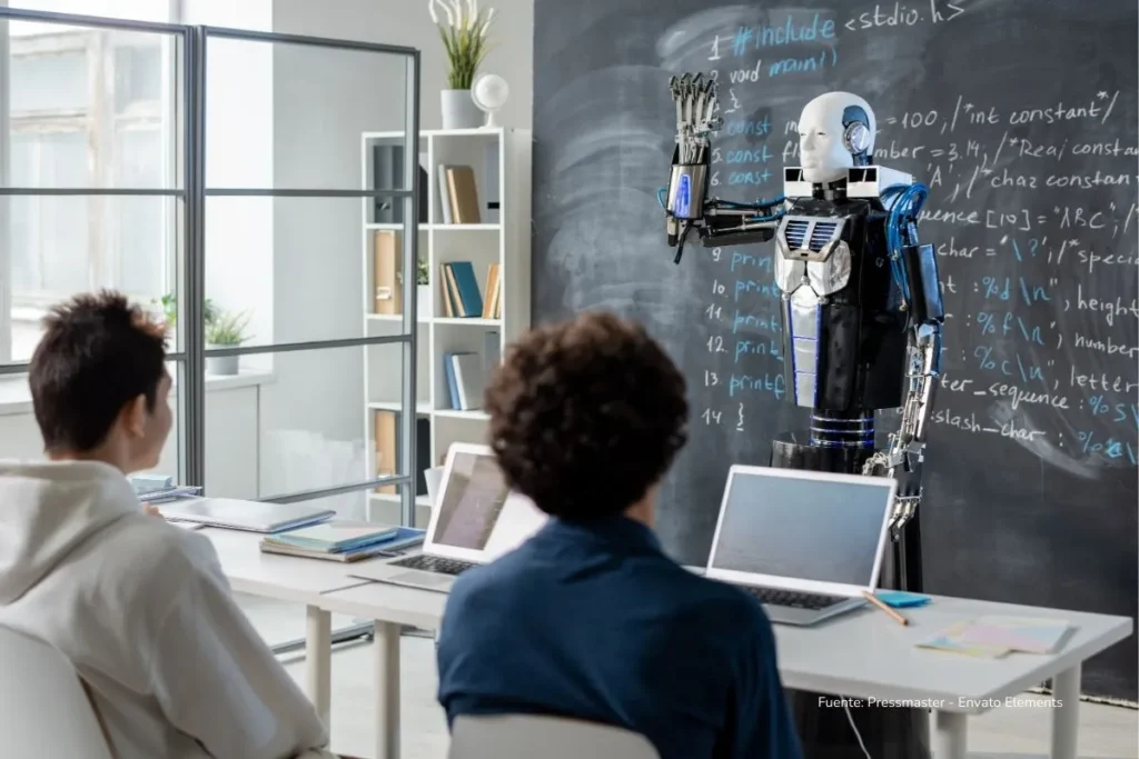 Cómo conseguir trabajo en 2026: la IA no te va a quitar tu empleo, alguien que sepa usarla sí 4 Robot humanoide explica contenidos frente a una pizarra mientras estudiantes observan desde sus computadores en un aula tecnológica.