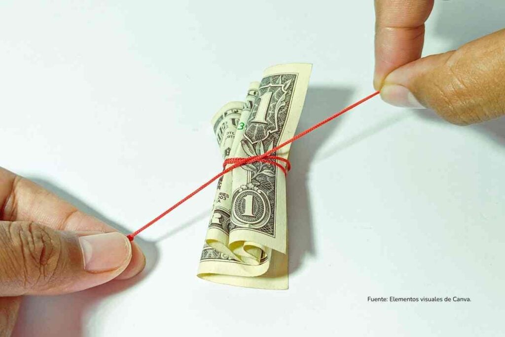 Deuda en Colombia 2026: por qué el riesgo fiscal ya inquieta a los mercados y al gasto social 4 Dólar amarrado con un hilo rojo