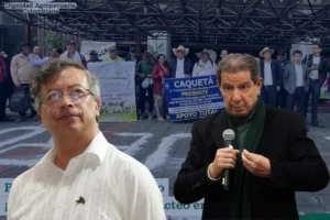 importaciones de leche 2026. Productores agropecuarios participan en una movilización mientras dirigentes políticos intervienen en el debate público